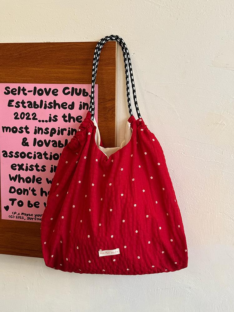 Korean large-capacity polka dot canvas bag, new lazy style commuter shoulder tote bag, niche versatile underarm bag