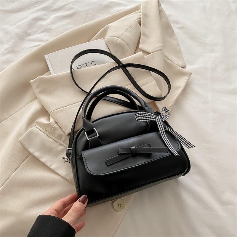 Bow fashion high-value handbag 2025 spring and summer new niche design versatile ins shoulder messenger bag