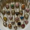 Vintage Flower Colored Opening and Closing Photo Album Necklace with a Female Design and Gold Plating