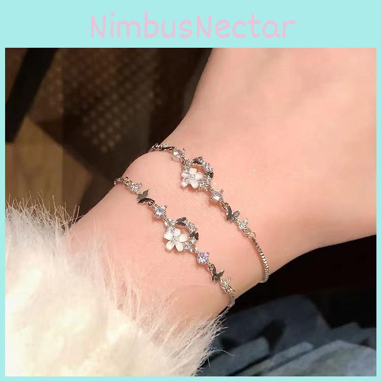 Silver Fashionable Womens Bracelet With Beautiful Floral And Design Butterfly
