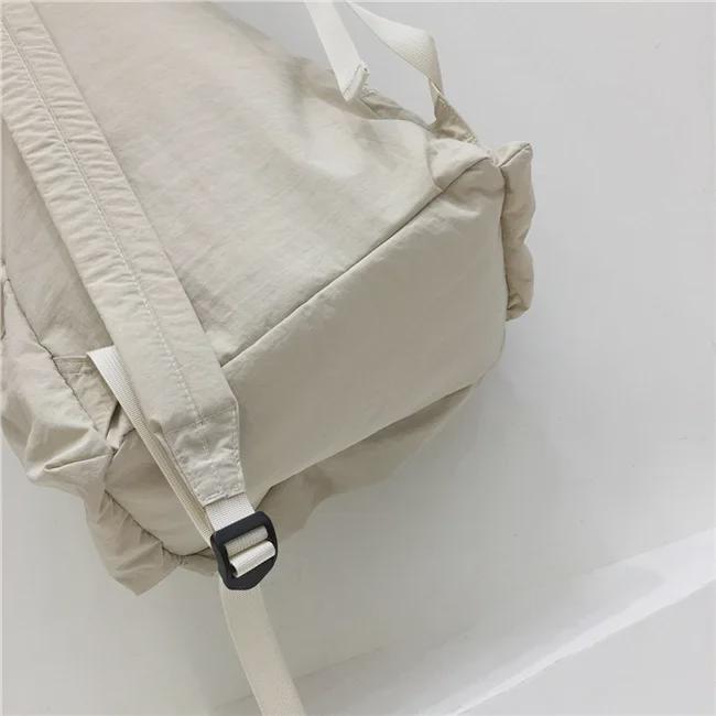 Introducing the New Simple Nylon Drawstring Backpack: a Spacious, Versatile Bag Perfect for Students, Leisure Trips, and Sports Activities.