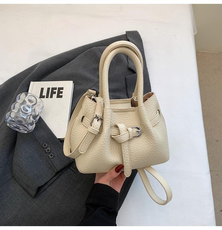 

2025 spring new niche high-end sense solid color fresh women s shoulder bag large capacity cloud messenger bag hand bag