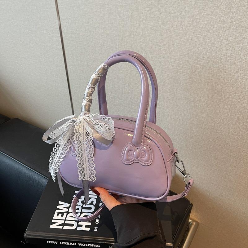 Spring and summer hand carry bow pillow bag women's new simple and fashionable shoulder bag high-end messenger bag