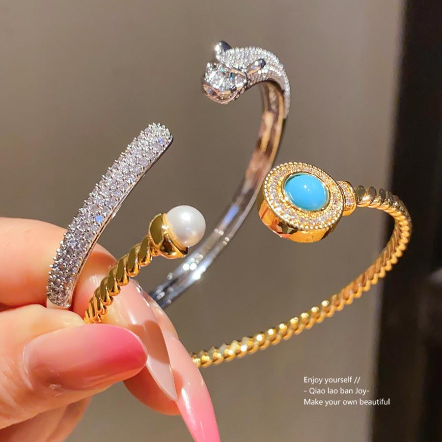Art Deco Copper Bracelet With Zircon And Pearl In Gold Finish For Elegant Women