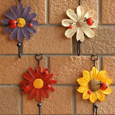 1 pezzo di moda vintage margherita fiore decorazione in ferro pareti appendiabiti ganci