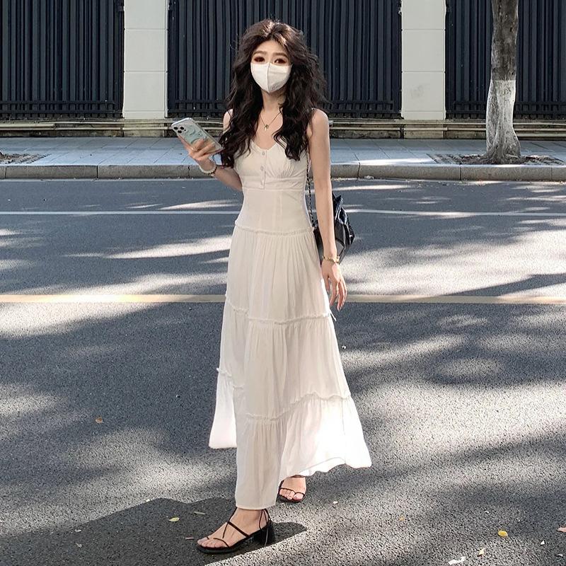 Gentle wind white suspender dress women's 2026 summer new high-end temperament versatile waist and thin dress