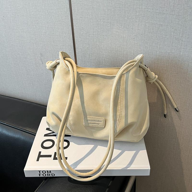 

Осень 2025 новый тренд корейская версия простой модной сумки-мессенджера корейский стиль нишевая ручная сумка однотонная сумка через плечо покинуть белый