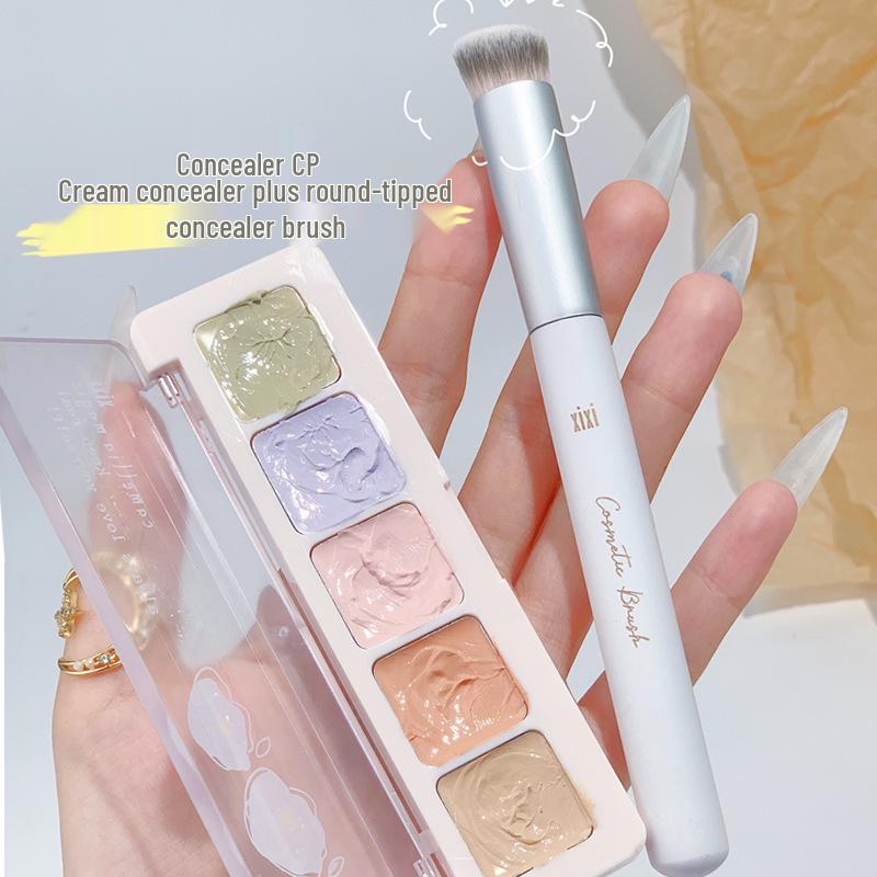 Xixi Concealer Cream: Perfect for acne scars, dark circles, and tear troughs. Moisturizing, natural, and available in five shades for beginners.
