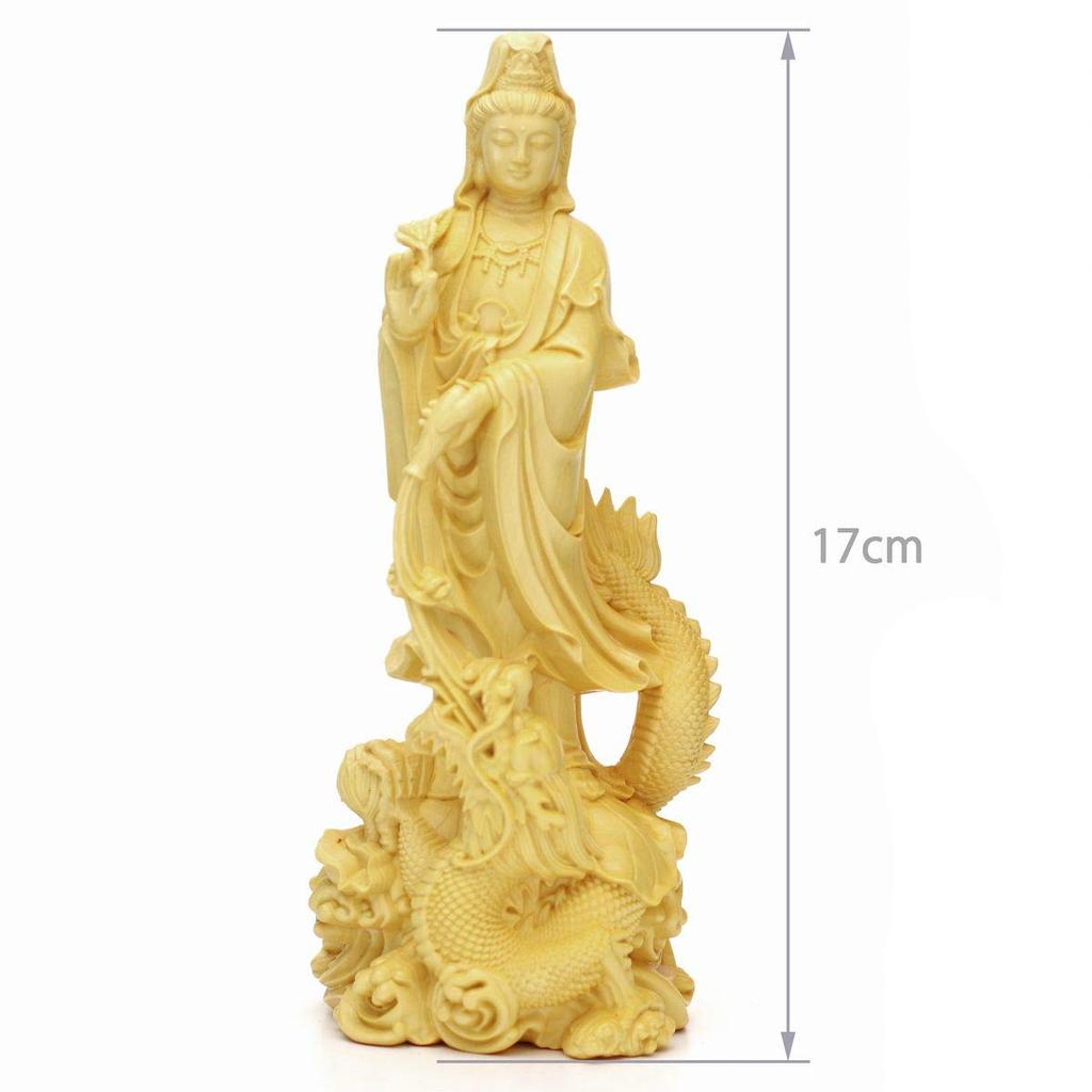Kannon Buddhist approximately 17cm made of natural This wood carving depicts the dragon representing the Dragon Riding and is a symbol of protection