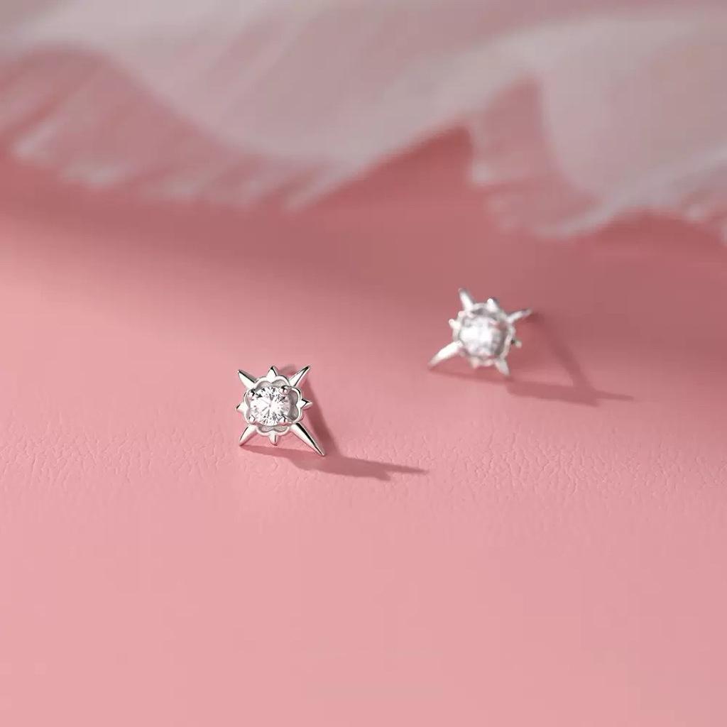 Beixi S999 Sterling Silver Star Earrings: Fashionable Eight-Pointed Studs with Black and White Cubic Zirconia