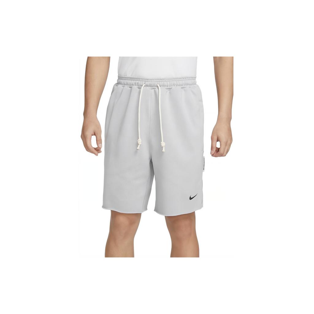 Nike Pantalones cortos de baloncesto Dri-FIT Sport Standard Issue de color sólido con cordones de tiro medio para hombre Gris Lobo Negro FN2891-012