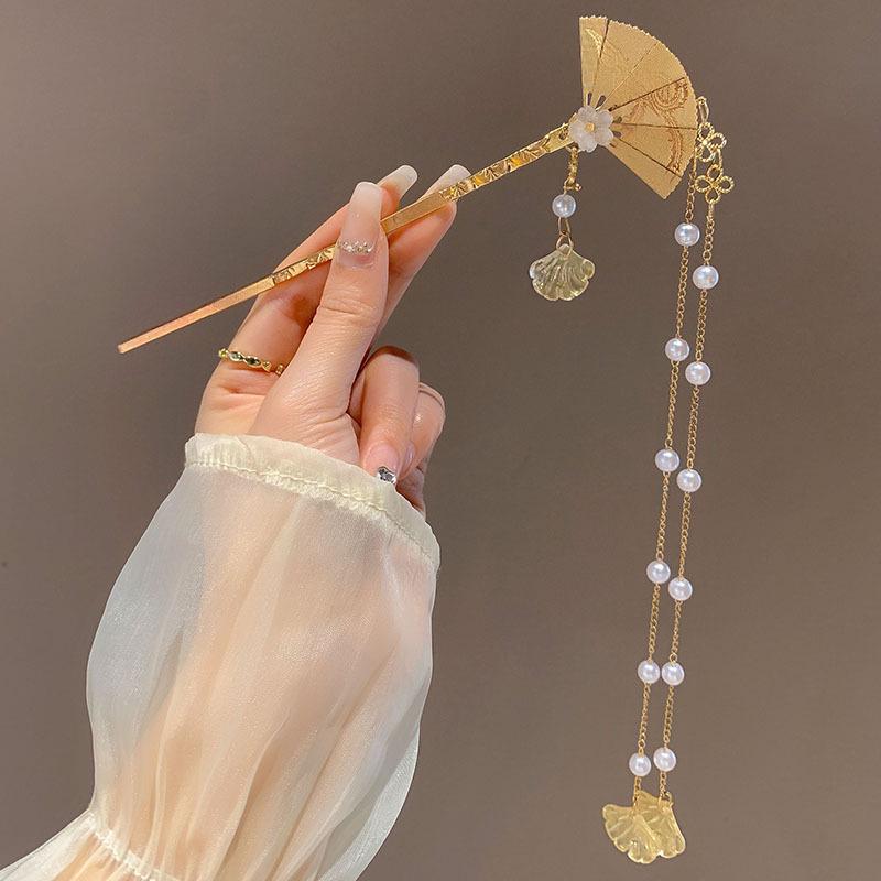 

Серебряная шпилька с полой кисточкой Miao: 2024 Новый китайский головной убор в древнем стиле Step-Shaking для женщин