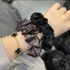Korean Satin-Feel Black Edge Hair Tie: High Elasticity Hair Accessory for Women