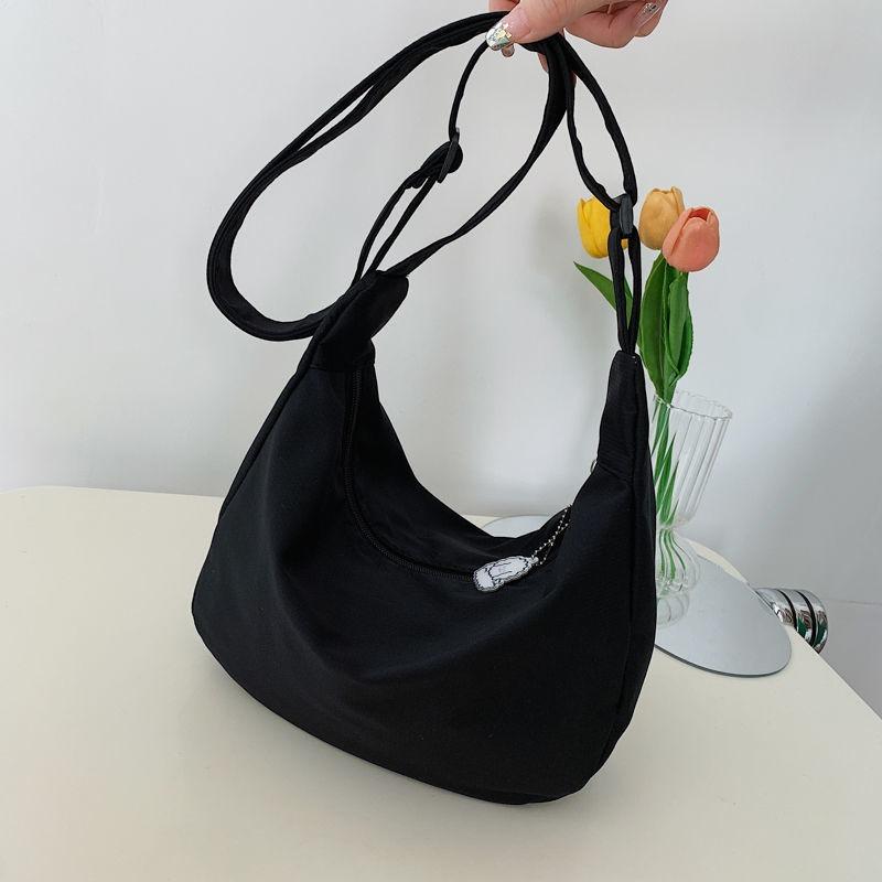 Kleine verse meisjes schoudertas effen kleur grote capaciteit schoudertas eenvoudige mode casual messenger bag dumpling tas