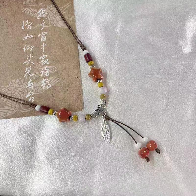 New Chinese style celebrity style ceramic ancient style long sweater chain twist necklace national style jewelry versatile sweater necklace