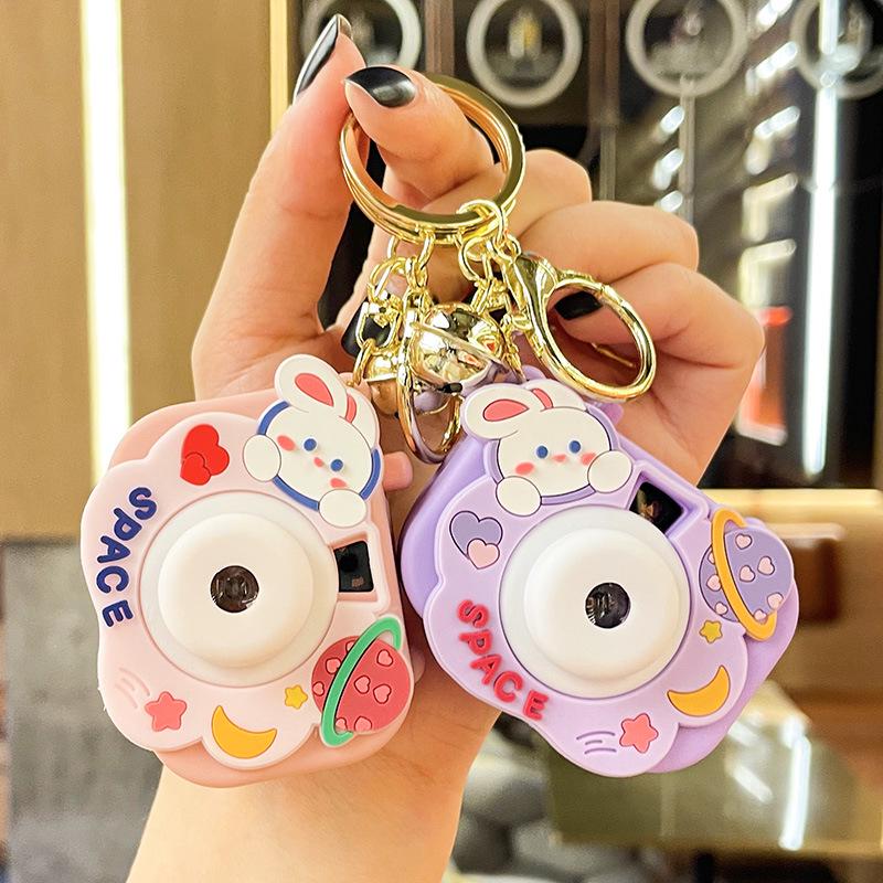 Little Rabbit Projector Light-Up Keychain: Cartoon Couple Bag Charm & Pendant Gift.