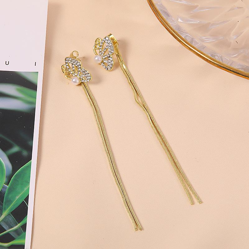 Silver Needle Rhinestone & Butterfly Tassel Earrings - Stylish, Exaggerated Slimming Studs for Women