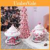 Leuchtende Süßigkeitenburg und Weihnachtsbaumschmuck für die Feiertagsdekoration