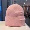 Korean version of fashion hole knitted wool hat men and women autumn and winter outdoor warm bag head cold hat lazy knitted hat
