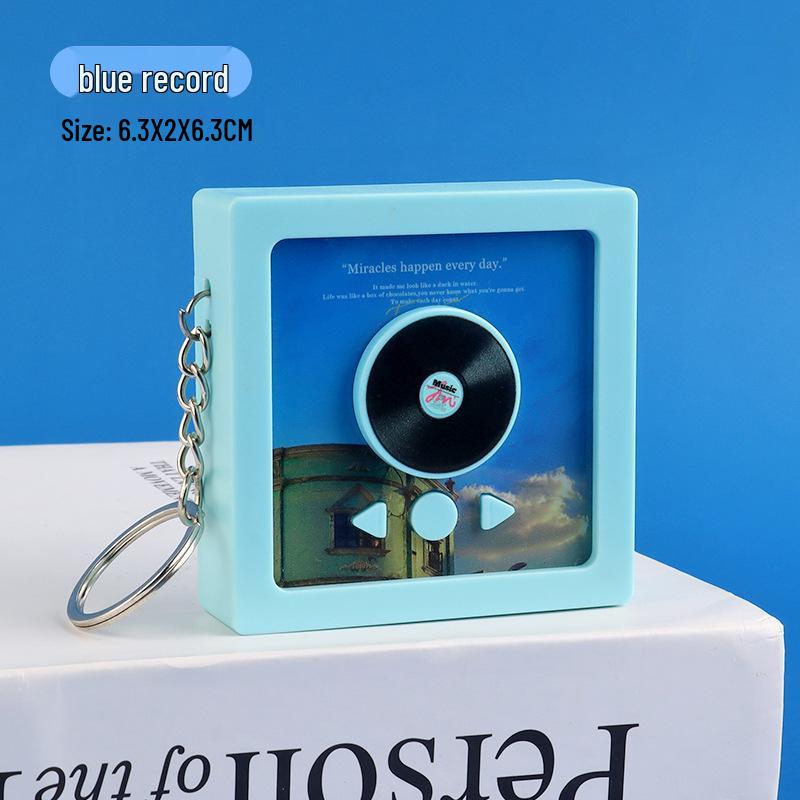Kids' Cartoon Record Player Toy: Captures, Engages, and Delights Baby's Senses - Fun Keychain