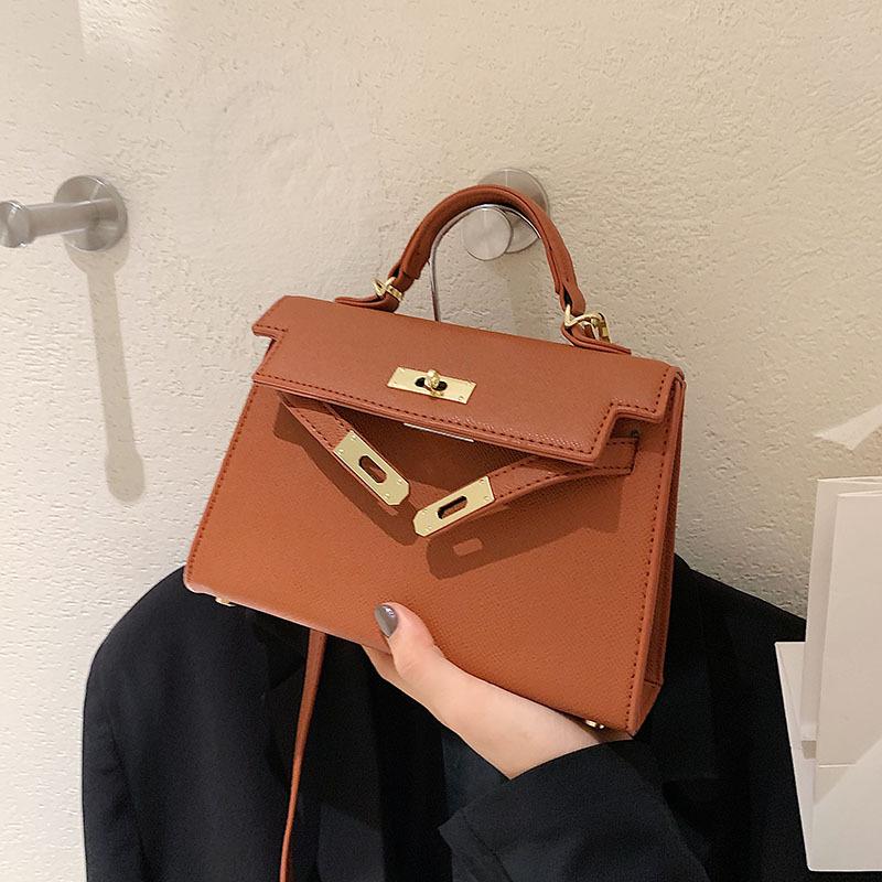 French niche lychee pattern handbag women's 2026 early spring versatile Kelly bag simple commuter messenger bag