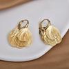 Light luxury super fairy hollow metal petal fringed ear buckle fashionable design high-end temperament elegant earrings