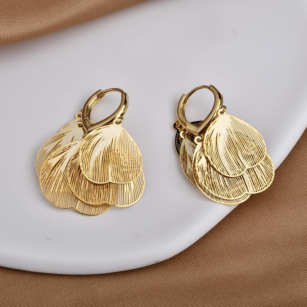 Light luxury super fairy hollow metal petal fringed ear buckle fashionable design high-end temperament elegant earrings