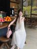 2026 new French lightweight three-dimensional flower neck sleeveless solid color pendulum long dress vacation dress women's tide