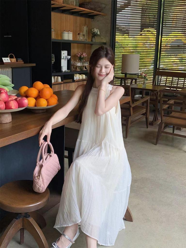 2026 new French lightweight three-dimensional flower neck sleeveless solid color pendulum long dress vacation dress women's tide
