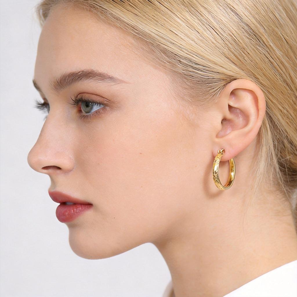 Gold earrings, large round style, electroplated round texture design, eye-catching earrings.