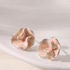 Xiaohongshu fashion temperament fairy wind dripping oil irregular petal stud earrings light luxury high-end earrings