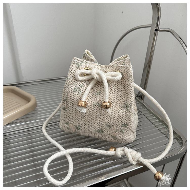 

Маленькая женская сумка с плетеным ремешком, новая коллекция 2025, повседневная универсальная ретро сумка-ведро из пляжной соломы, на плечо или через плечо
