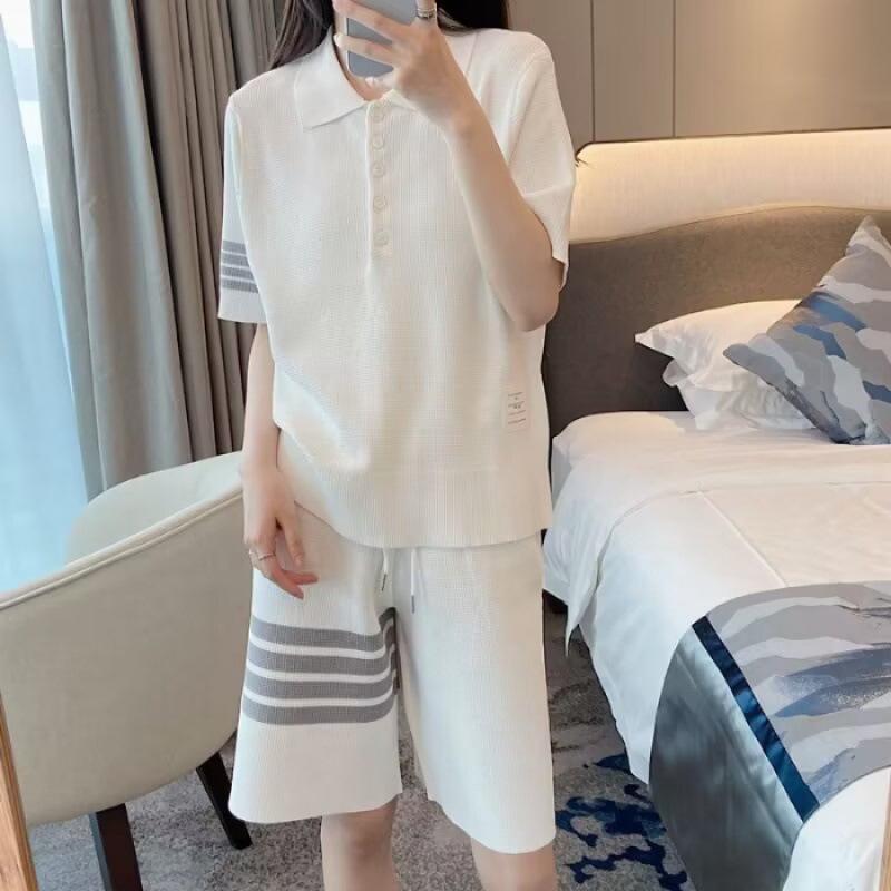 

Женский летний вафельный спортивный комплект из двух предметов с коротким рукавом и воротником поло Large белый