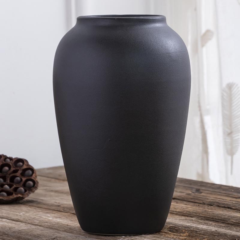 

Modern Minimalist Black Ceramic Vase for Fresh Flowers and Lucky Bamboo