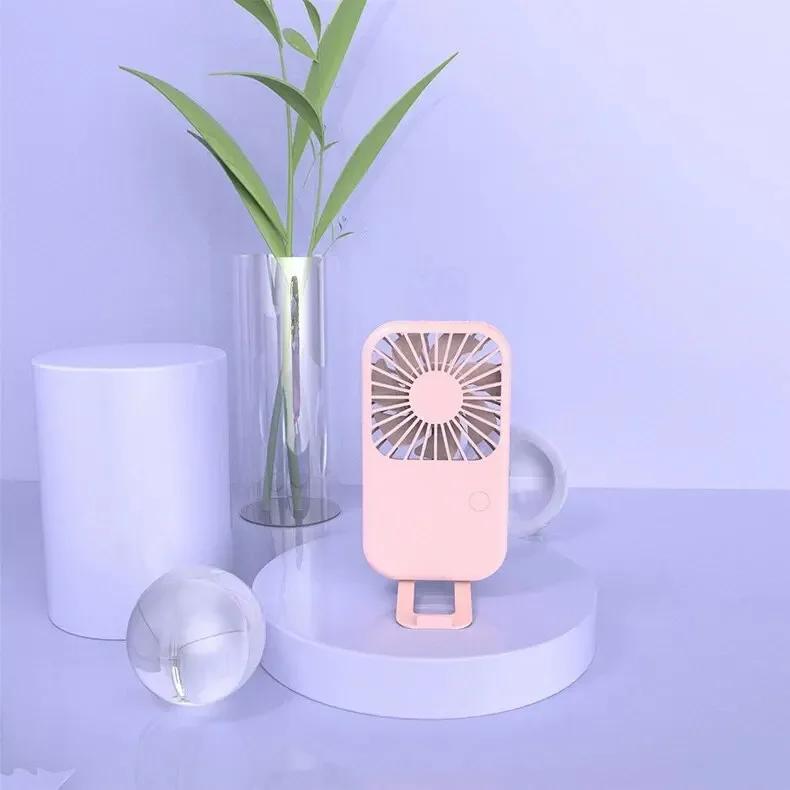 

Compact Mini Fan Rechargeable Stand Small Pocket Fan with Three Wind Speeds Powerful Range Long-lasting USB Fan рожевий