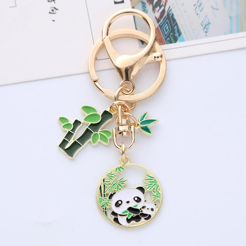 Quirky Cartoon Panda Alloy Keychain Pendant with Cute Bamboo Leaf Design - Earphone Case & Bag Decoration