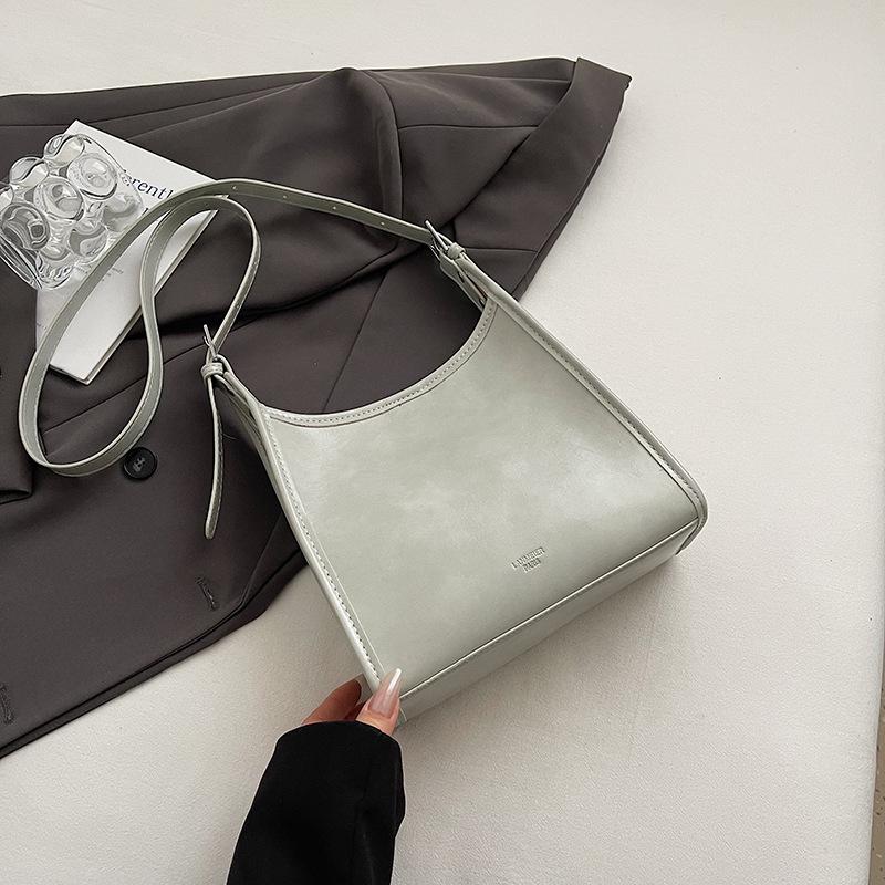 Premium feeling hand carrying bucket bag women's Korean version fashion versatile shoulder bag 2025 spring and summer new simple casual women's bag