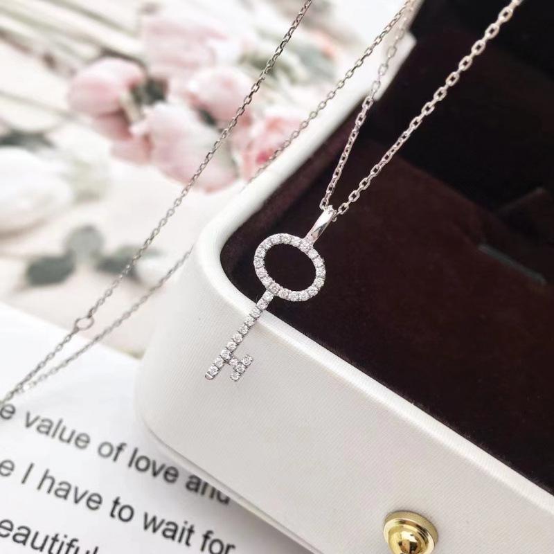 Ethereal Rhinestone Hollow Key Necklace for Women - Designer, Simple, Light Luxury, Ins Style Collarbone Chain.