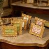 Tabletop Jewelry Display Holder with Ornate Frame, Four Ring Rows for Counter Merchandising, Vanity Storage, and Styling Use