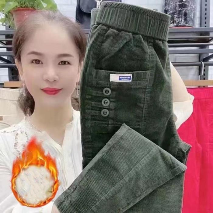 

Жіночі осінньо-зимові потовщені вельветові штани гаремного крою з високою посадкою, що облягають, зі звуженими штанинами 3XL темно-зелений колір