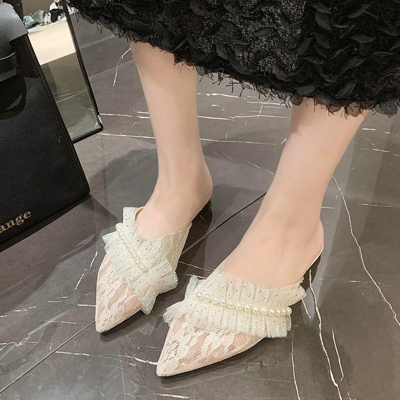 Women wearing pearl sandals in the autumn and winter of 2025, the new ruffle leaf edge lace pointed head low heel thick heel half pack of slippers wom