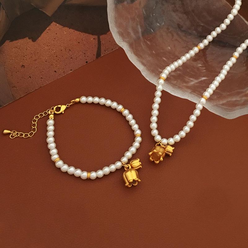 Copper-Plated Gold Lily of the Valley Pearl Bracelet - Elegant French Style Clavicle Chain for Women