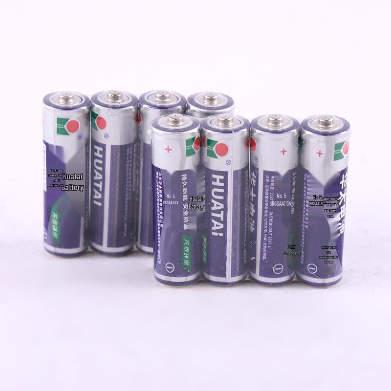 Huatai Silver 1.5V Carbon Battery for Remote Controls, Bubble Machines, and Calculators (AA/AAA).