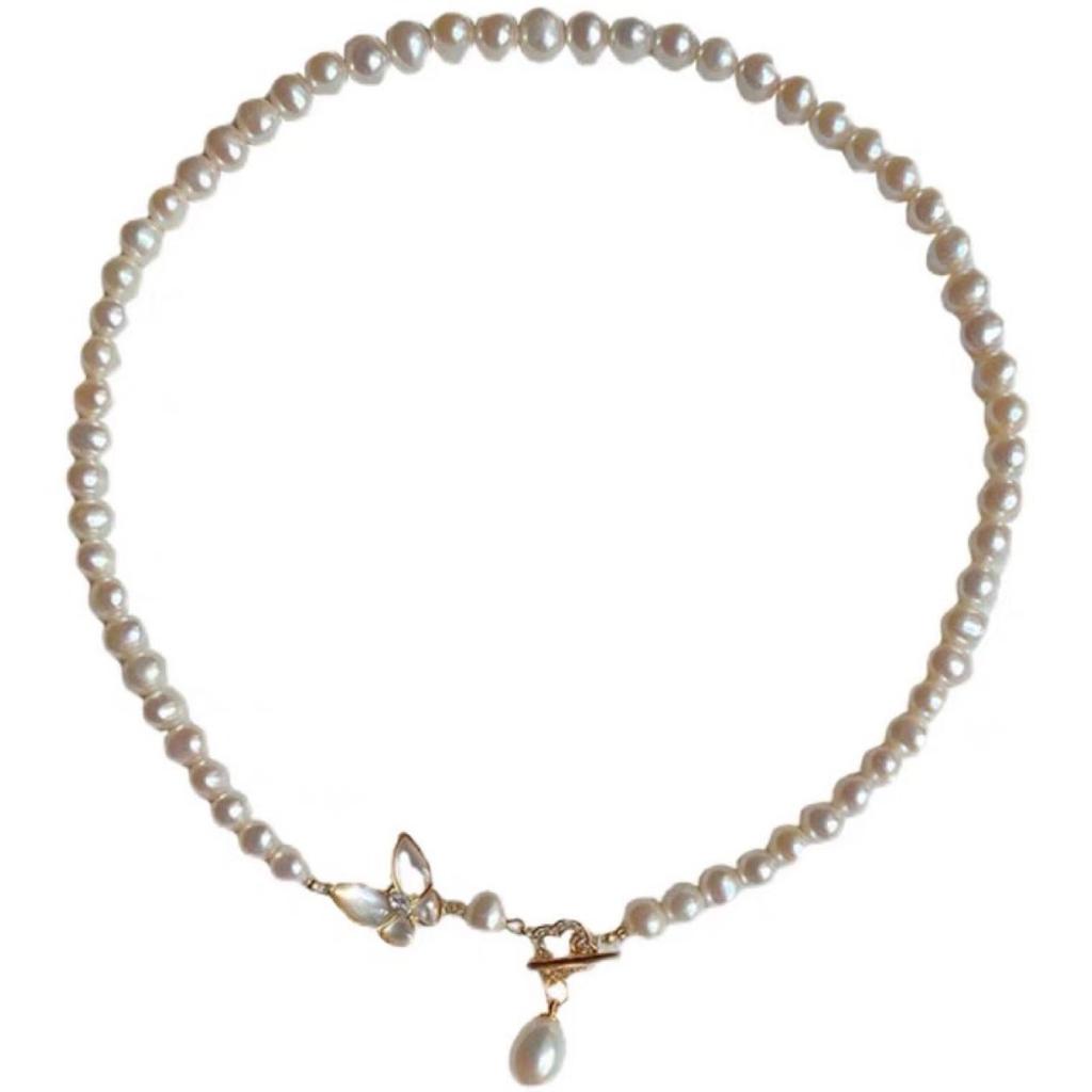 Designer-style necklace featuring natural freshwater pearls and a near-round, mother-of-pearl butterfly pendant 14k Gold-plated Sweet necklace with a