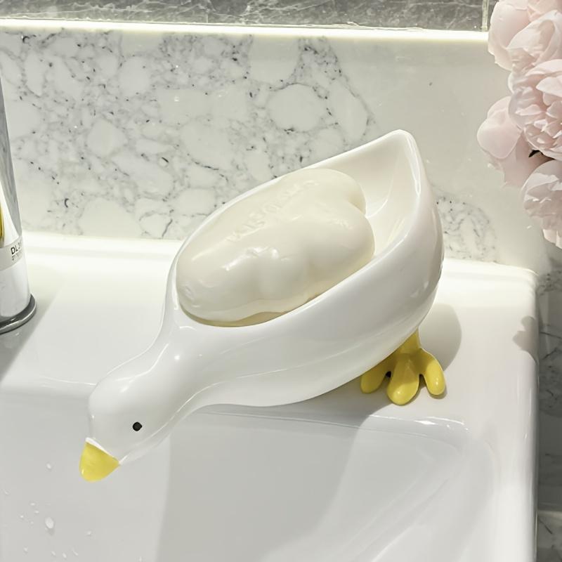 

Cute duck shaped soap dish with self draining function - perfect for bathroom and sink accessories to keep soap dry and clean белый