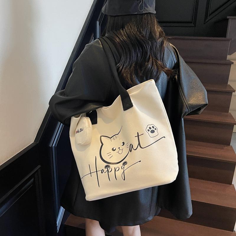 Large Capacity Tote Bag 2025 Autumn New Korean Version of Fashion Niche Cartoon Canvas Bag Casual Commuter Shoulder Bag