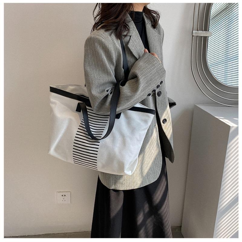 

Bags Women s tote bags New large-capacity portable canvas bags Student class commuting shoulder bags чёрный