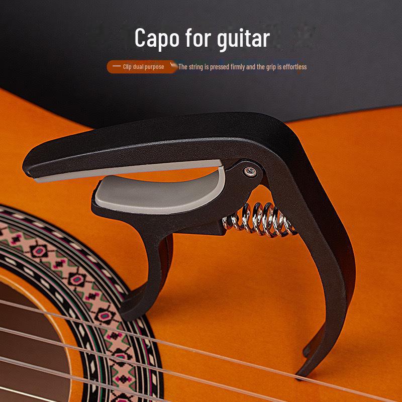 Folk-Gitarre und Ukulele Doppelzweck Nylon Tonhöhenveränderungs-Clip: Tonhöhe sowohl bei E-Gitarren als auch bei klassischen Gitarren ändern.