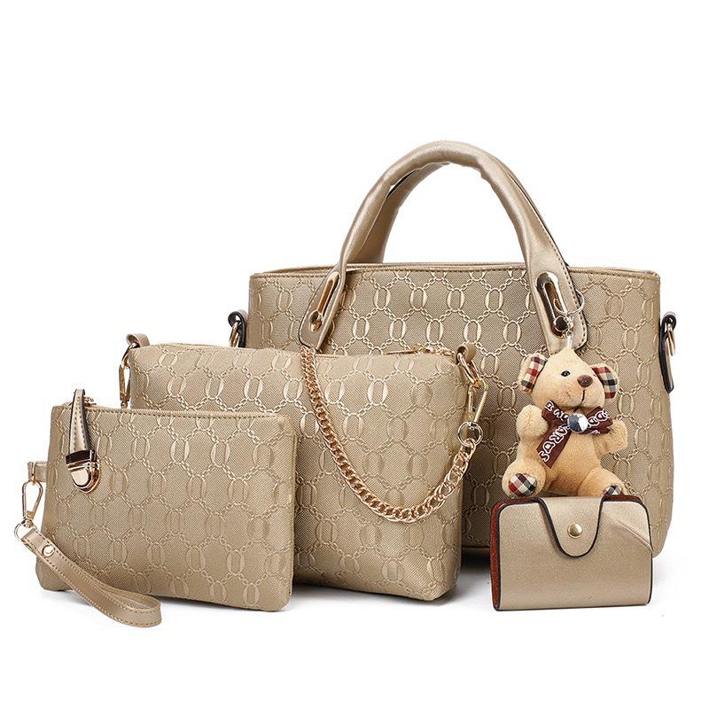 

Classic New 2026 Women s Bag New Fashion Women s Bag Little Bear Pendant Fashion Embossed Baby Mother Bag Set of 4 32x22x10 сірий