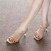 Dünner Absatz transparenter Ein-Wort-Riemen High Heel Halbschlappen Damen Sandalen 2025 Sommer neu Strass High Heels Feenstil Pantoletten